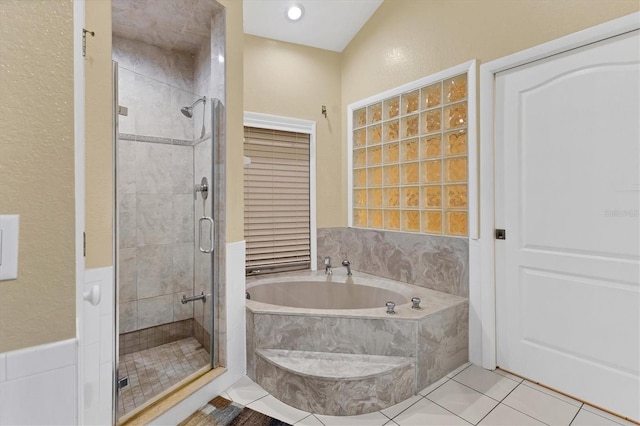 4405 Harbor Blvd, Port Charlotte, FL 33952 - full bath with a stall shower, a bath, and tile patterned floors
