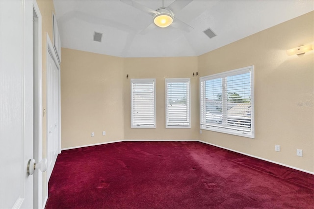 4405 Harbor Blvd, Port Charlotte, FL 33952 - empty room featuring carpet flooring, ceiling fan, vaulted ceiling, and baseboards