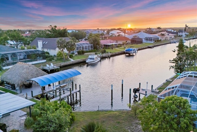 4405 Harbor Blvd, Port Charlotte, FL 33952 - water view with boat lift, a boat dock, and nearby suburban area