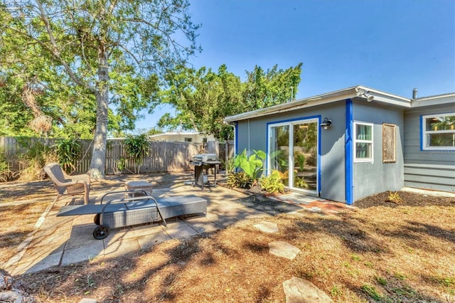 view of patio with fence and grilling area
