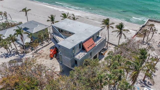 aerial view with a beach view and a water view