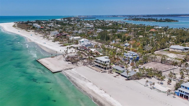 aerial view with a beach view and a water view