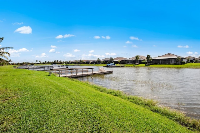 11611 Roseto Ct, Fort Myers, FL 33913 - dock with a water view, a lawn, and a residential view