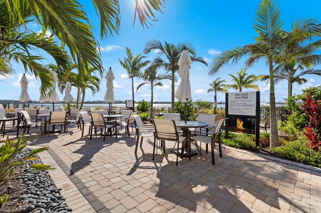 11611 Roseto Ct, Fort Myers, FL 33913 - view of patio with outdoor dining space
