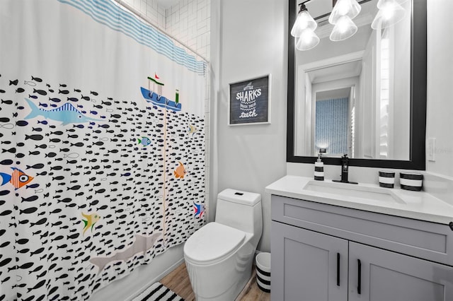 11611 Roseto Ct, Fort Myers, FL 33913 - full bathroom featuring vanity, toilet, and a shower with shower curtain