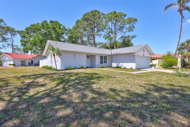 3978 Lemonwood Dr, Sarasota, FL 34232 - ranch-style home with concrete driveway, a front lawn, a garage, and stucco siding