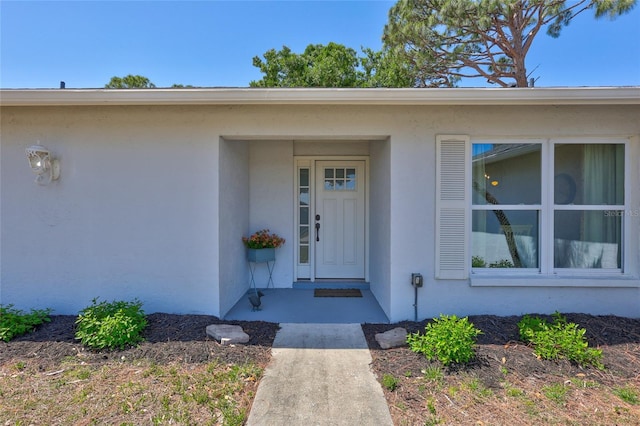 3978 Lemonwood Dr, Sarasota, FL 34232 - entrance to property featuring stucco siding