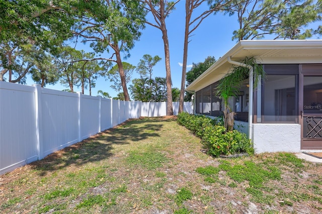 3978 Lemonwood Dr, Sarasota, FL 34232 - view of yard with a fenced backyard and a sunroom