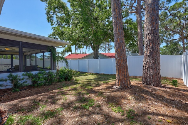 3978 Lemonwood Dr, Sarasota, FL 34232 - view of yard with a fenced backyard and a sunroom