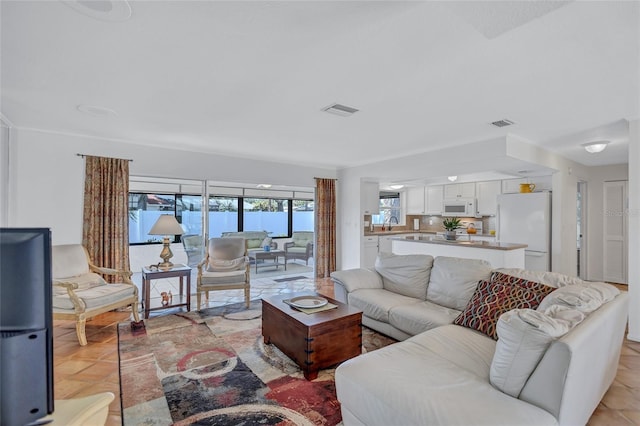 3978 Lemonwood Dr, Sarasota, FL 34232 - living area featuring visible vents