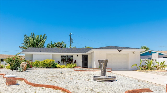 6628 Keystone Dr, Sarasota, FL 34231 - single story home featuring a garage, concrete driveway, and fence