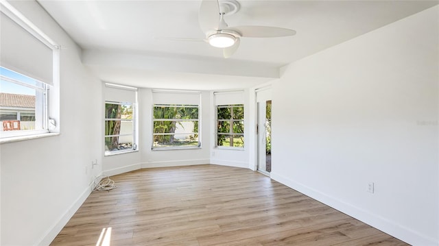 6628 Keystone Dr, Sarasota, FL 34231 - empty room with ceiling fan, light wood-type flooring, and baseboards
