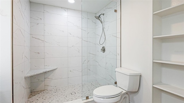 6628 Keystone Dr, Sarasota, FL 34231 - full bathroom with tiled shower, toilet, and recessed lighting