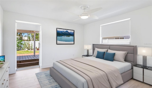 6628 Keystone Dr, Sarasota, FL 34231 - bedroom with access to exterior, light wood-style flooring, and ceiling fan