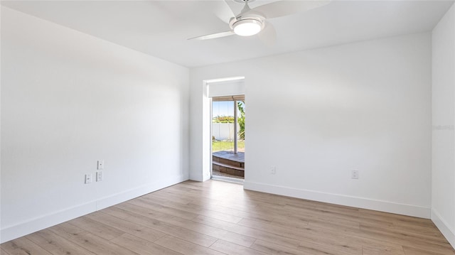6628 Keystone Dr, Sarasota, FL 34231 - unfurnished room with a ceiling fan, light wood-style flooring, and baseboards