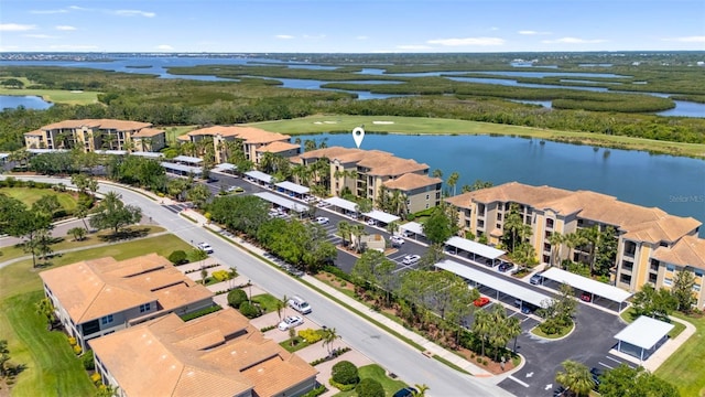 7803 Grand Estuary Trl Unit 102, Bradenton, FL 34212 - aerial view with a water view and view of golf course