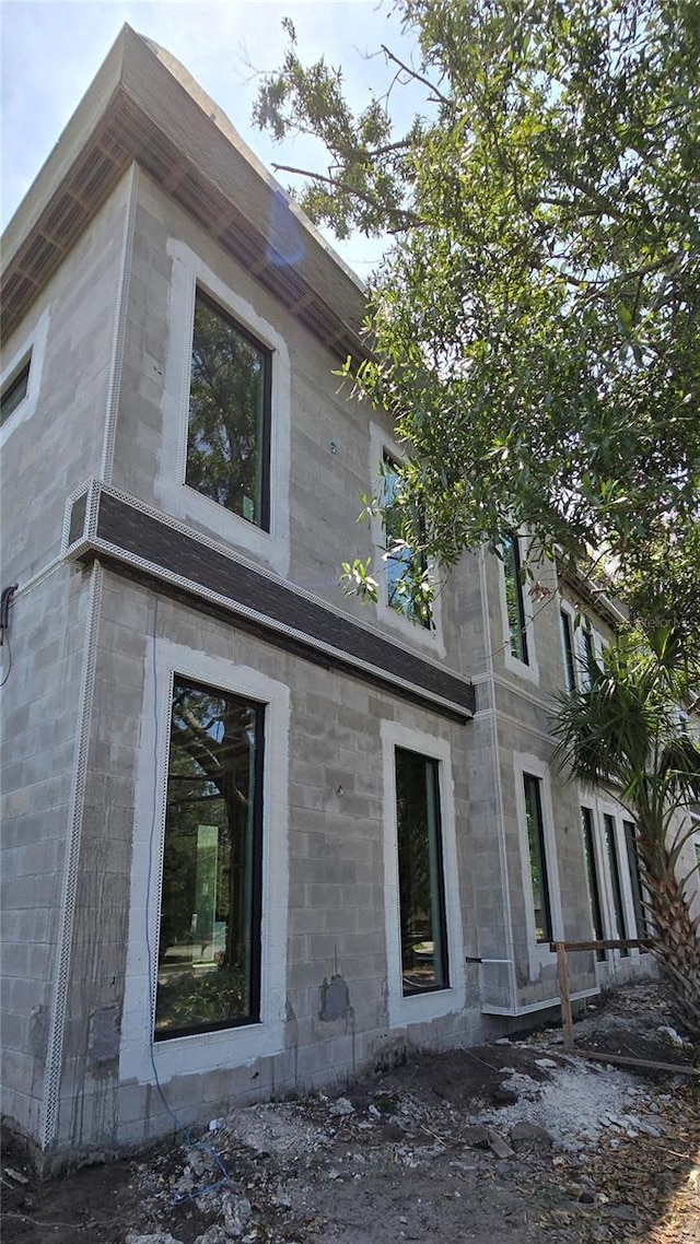 1423 S Shade Ave, Sarasota, FL 34239 - view of side of home featuring stone siding