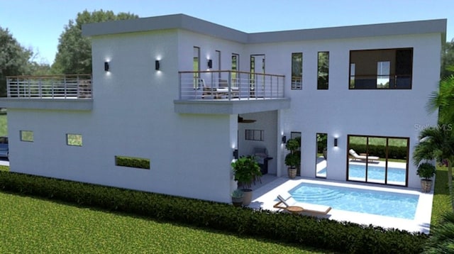 1423 S Shade Ave, Sarasota, FL 34239 - back of house with a balcony, an outdoor pool, stucco siding, and a patio area