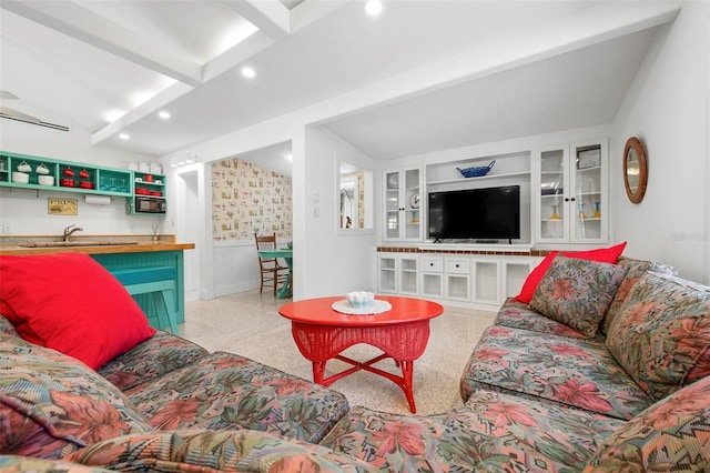 living room featuring recessed lighting, speckled floor, baseboards, and beamed ceiling