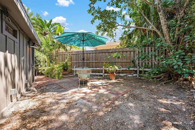 view of patio / terrace featuring fence