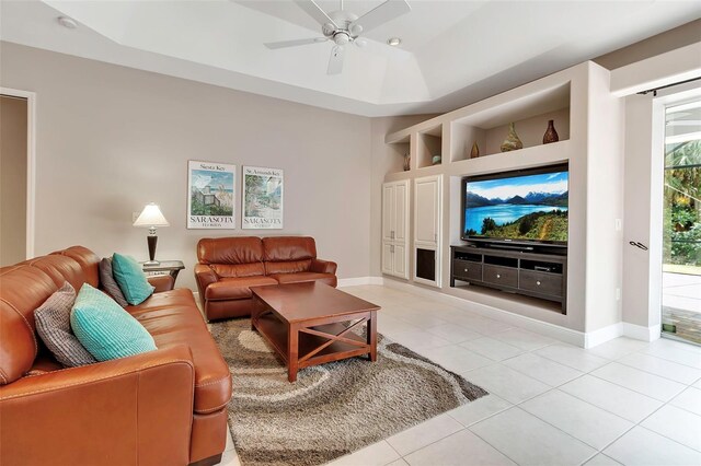 3738 Eagle Hammock Dr, Sarasota, FL 34240 - living area with a raised ceiling, baseboards, a ceiling fan, and light tile patterned floors