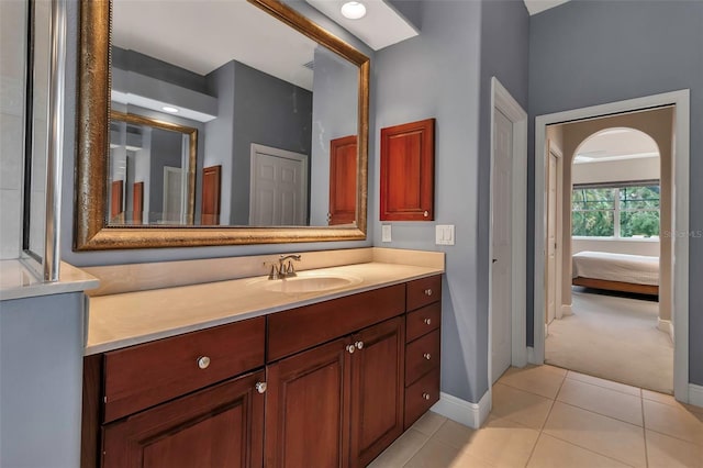 3738 Eagle Hammock Dr, Sarasota, FL 34240 - bathroom with tile patterned flooring, baseboards, and vanity