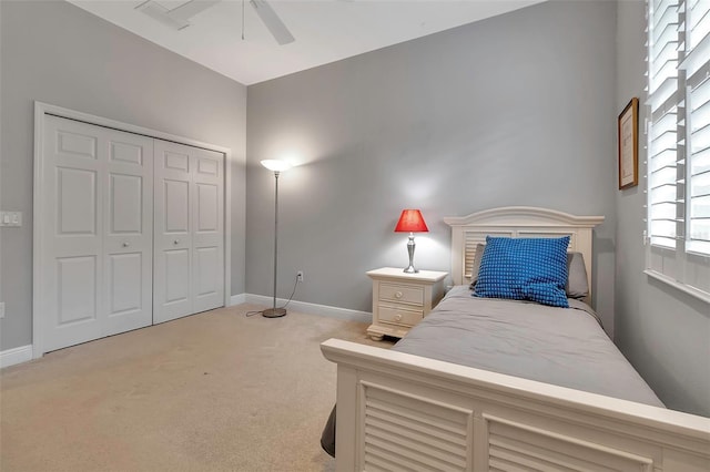 3738 Eagle Hammock Dr, Sarasota, FL 34240 - carpeted bedroom with baseboards, a closet, and ceiling fan
