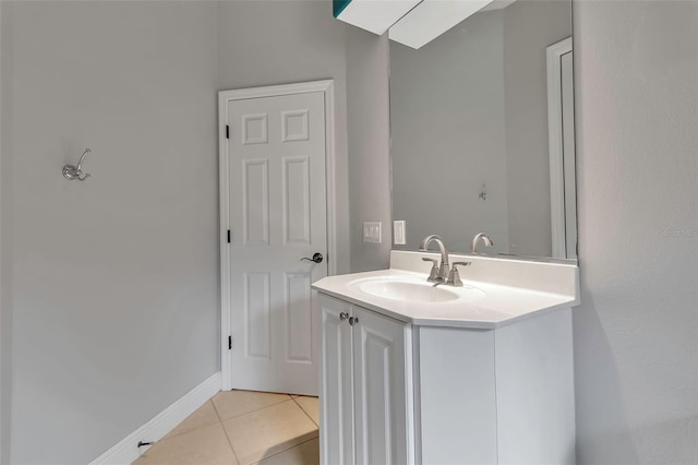 3738 Eagle Hammock Dr, Sarasota, FL 34240 - bathroom with baseboards, vanity, and tile patterned floors