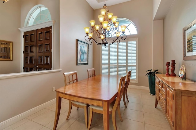 3738 Eagle Hammock Dr, Sarasota, FL 34240 - dining room featuring baseboards, light tile patterned floors, and an inviting chandelier