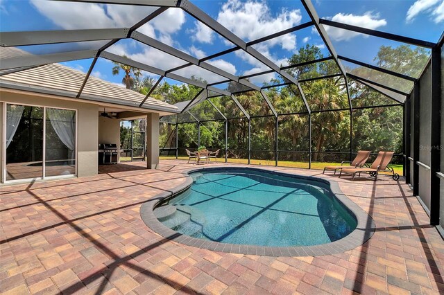 3738 Eagle Hammock Dr, Sarasota, FL 34240 - pool with ceiling fan, a lanai, a grill, and a patio