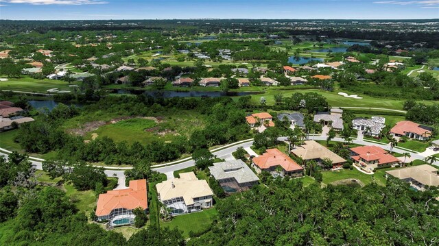 3738 Eagle Hammock Dr, Sarasota, FL 34240 - aerial view featuring golf course view, a residential view, and a water view