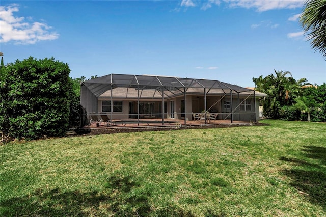 3738 Eagle Hammock Dr, Sarasota, FL 34240 - rear view of house with a lawn, a patio, and glass enclosure