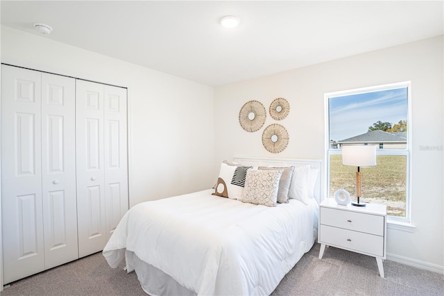 21077 Baffin Ave, Port Charlotte, FL 33954 - carpeted bedroom with a closet and baseboards