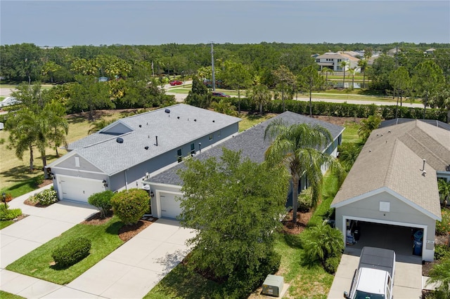 birds eye view of property with a residential view