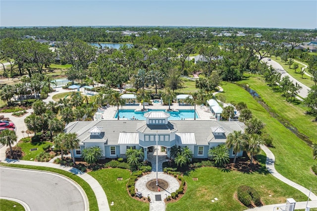 bird's eye view with a water view