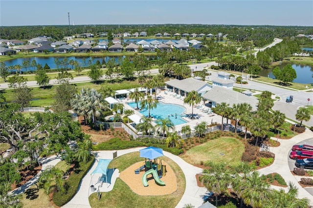 aerial view with a water view and a residential view