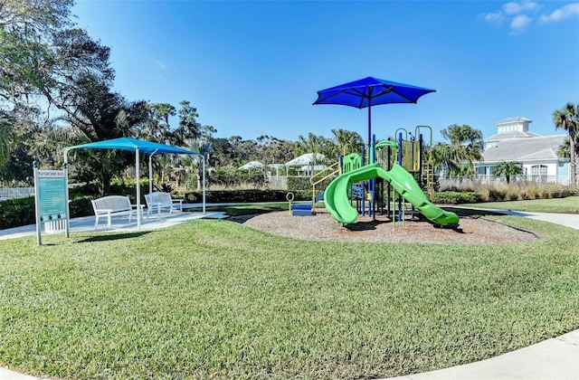 community play area with a yard