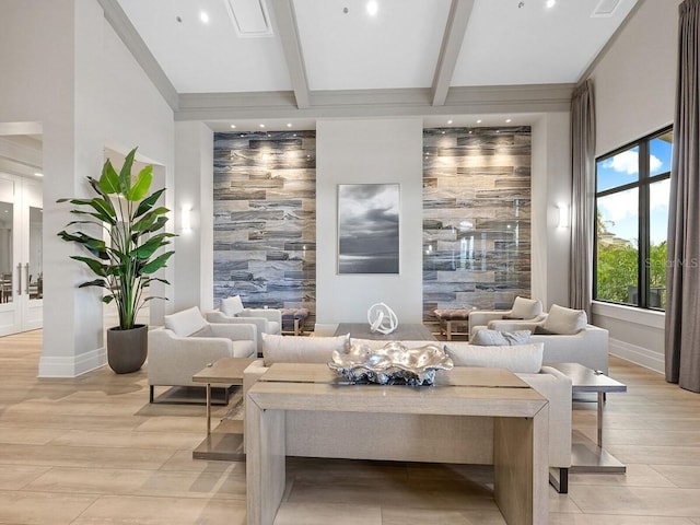 building lobby featuring beam ceiling