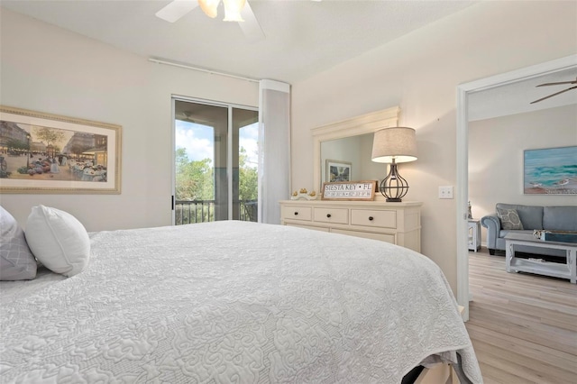 bedroom featuring access to outside, ceiling fan, and wood finished floors