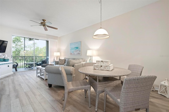 9630 Club S Cir Unit 6201, Sarasota, FL 34238 - dining area with light wood finished floors and ceiling fan