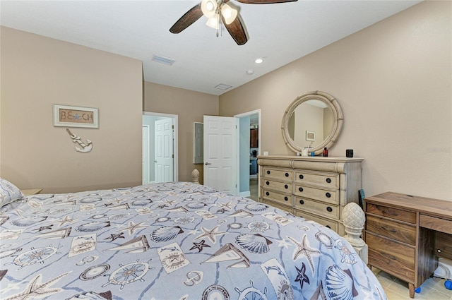bedroom with visible vents, ceiling fan, and light tile patterned floors