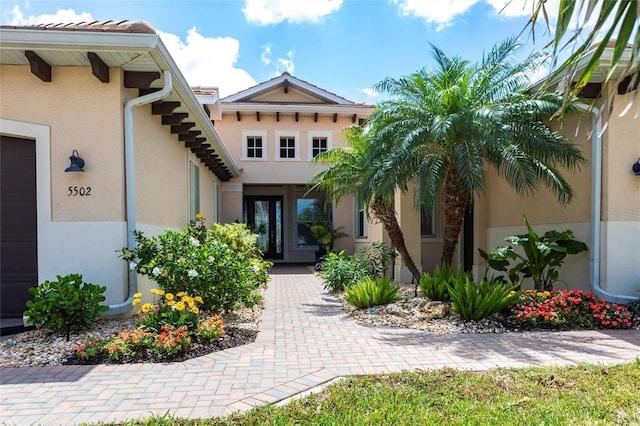 5502 Tidewater Preserve Blvd, Bradenton, FL 34208 - doorway to property featuring stucco siding