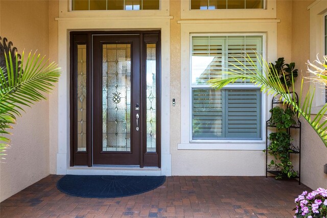 5502 Tidewater Preserve Blvd, Bradenton, FL 34208 - property entrance with stucco siding