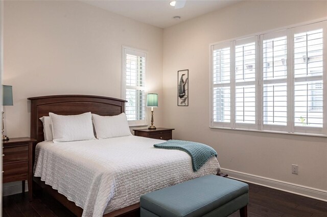 5502 Tidewater Preserve Blvd, Bradenton, FL 34208 - bedroom featuring wood finished floors, baseboards, and multiple windows
