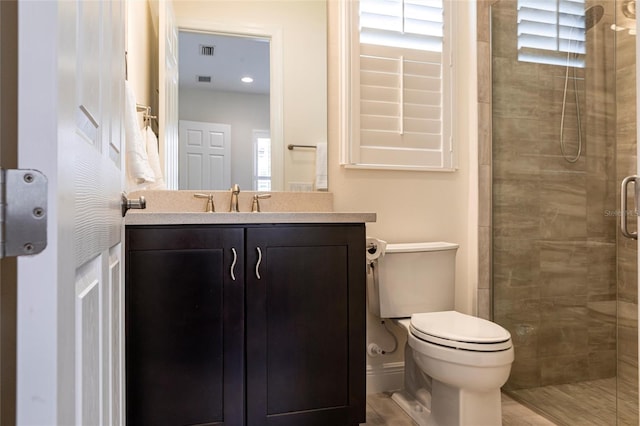 5502 Tidewater Preserve Blvd, Bradenton, FL 34208 - bathroom featuring toilet, a shower stall, and vanity