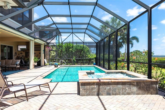 5502 Tidewater Preserve Blvd, Bradenton, FL 34208 - view of pool featuring a patio area, glass enclosure, and a pool with connected hot tub