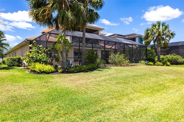 5502 Tidewater Preserve Blvd, Bradenton, FL 34208 - view of green lawn with glass enclosure