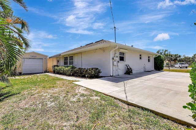 519 Bayview Ave, Osprey, FL 34229 - view of front of home with stucco siding