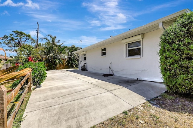 519 Bayview Ave, Osprey, FL 34229 - rear view of house featuring a patio area and stucco siding