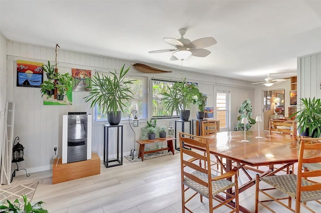 519 Bayview Ave, Osprey, FL 34229 - dining room featuring a ceiling fan and light wood-style floors